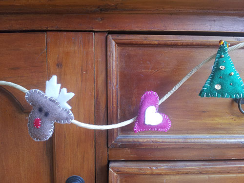 Handmade felt Christmas decorations for a Xmas garland